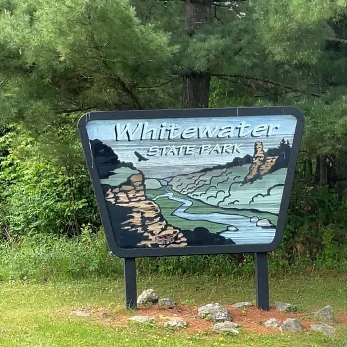 The carved entrance sign at Whitewater State Park